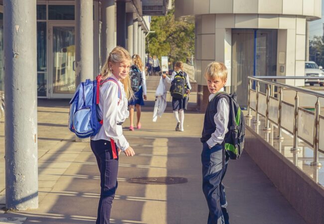 people walking on sidewalk during daytime